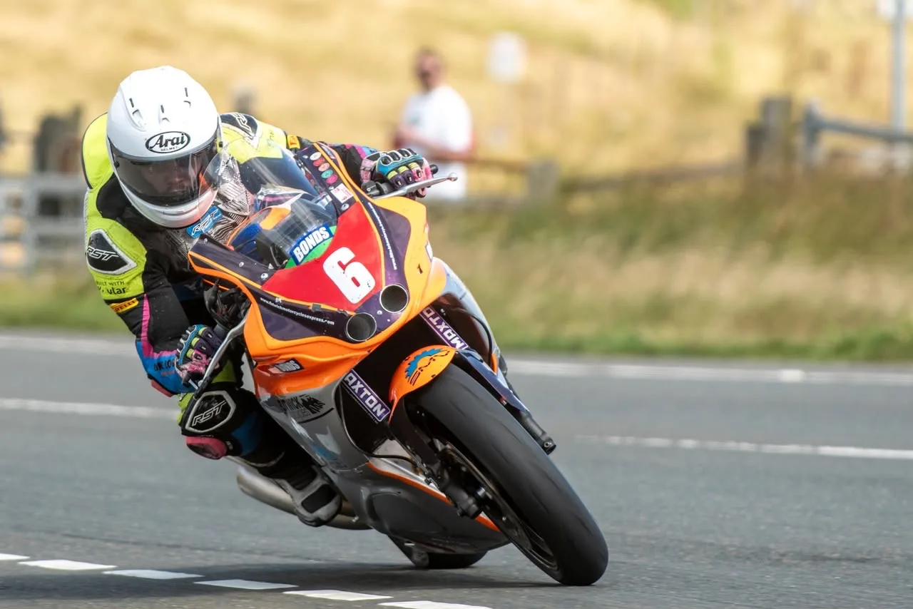 Johnny Stewart takes the victory in spectacular style in the Road Racing News Sportbike race