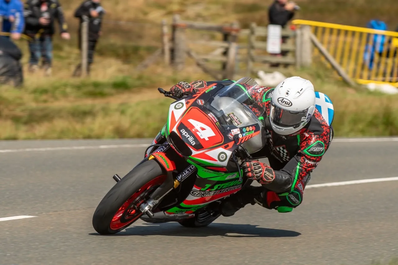 Johnny Stewart takes the victory in spectacular style in the Road Racing News Sportbike race